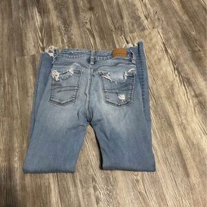Distressed Blue Jeans